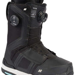 Black and white K2 Orton snowboard boot with a blue sole and Boa lacing system.