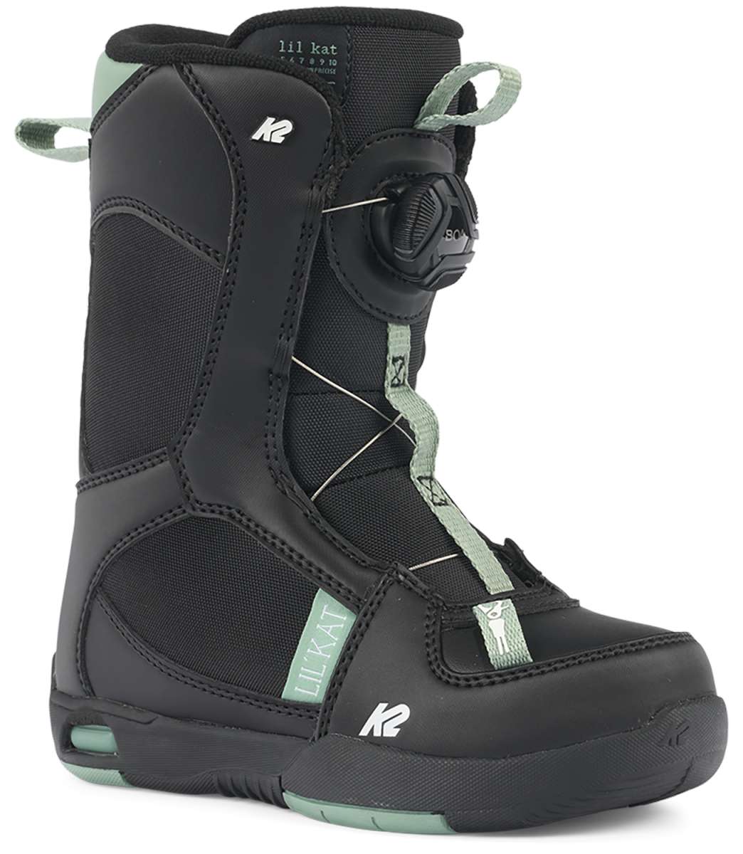 K2 Youth Lil Kat snowboard boots feature a black and green design with a convenient speed lace system.