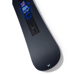 Arbor Metal Machine 2026 - A black snowboard with a blue graphic of a monster-like creature on top, wearing goggles and holding ski poles.