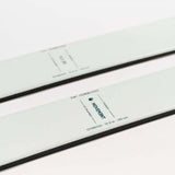 Movement Women's Fly 95 Skis 2024 - White skis with black bindings and a black stripe down the middle.