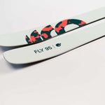 Movement Women's Fly 95 Skis 2024 - White skis with a red and black logo on top.