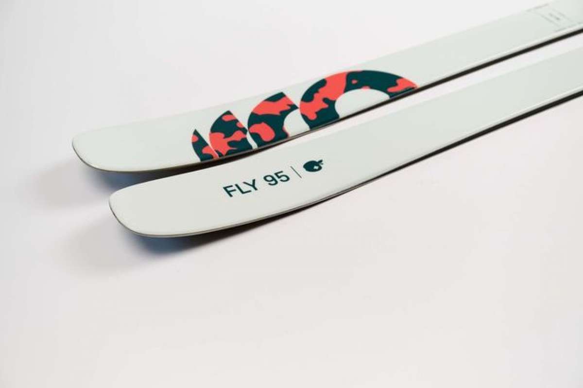 Movement Women's Fly 95 Skis 2024 - White skis with a red and black logo on top.