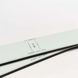 Movement Women's Fly 95 Skis 2024 - White skis with black bindings and a green logo on top.