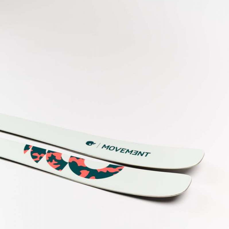Movement Women's Fly 95 Skis 2024 - White skis with a black and pink logo on top.