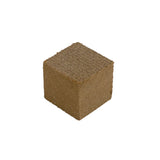 Oneball Gummy Stone 2025 - A brown, cube-shaped stone with a rough texture and small holes on its surface.