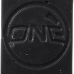 Oneball X-Wax Cold 21 - 5F 2025 - A rectangular, black wax block with illegible white text on its top surface.