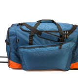 Destiny Large Team Wheel Bag 2023 - A large blue duffel bag with black wheels and handle, featuring a zippered front pocket.