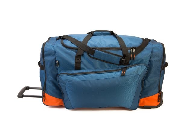Destiny Large Team Wheel Bag 2023 - A large blue duffel bag with black wheels and handle, featuring a zippered front pocket.