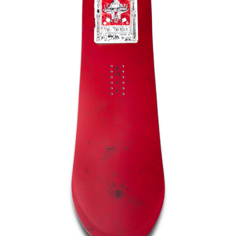 Red snowboard deck front view with white label graphic near the nose