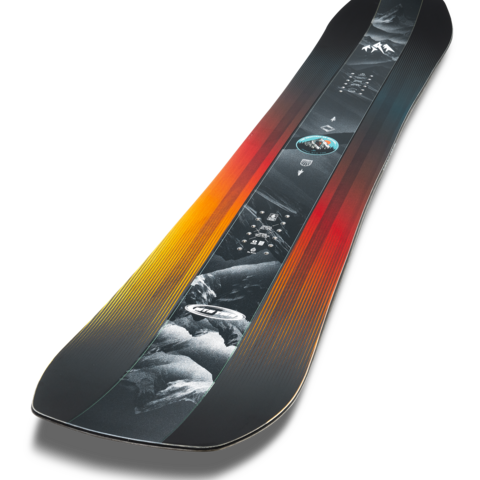 Twin snowboard with angled mountain art and red–orange–yellow gradient stripes