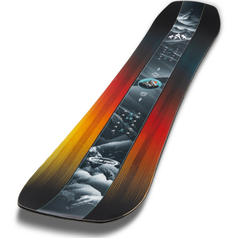 Junior twin-tip snowboard deck in angled view with red, orange, and yellow stripe artwork
