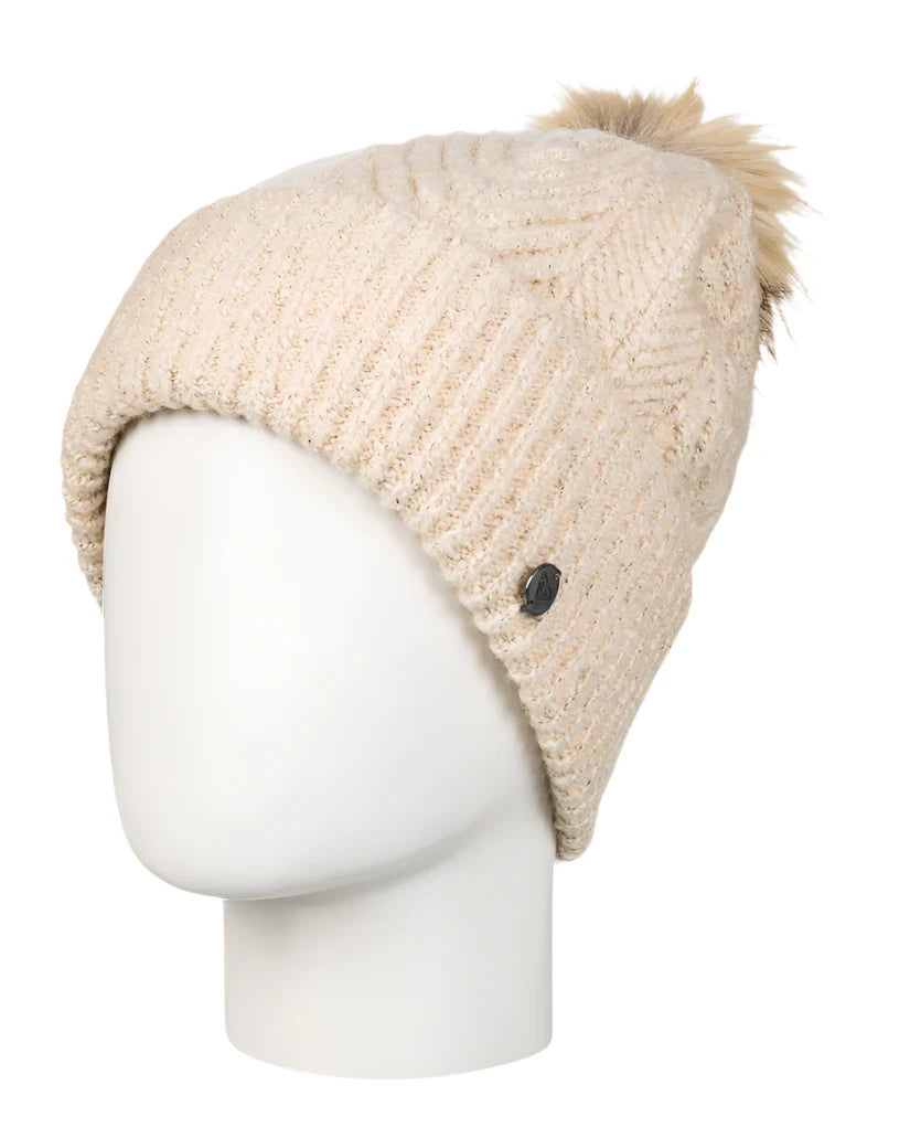 Roxy Women's Peak Chic Beanie 2025 - A cream-colored beanie with a subtle knit pattern and a small, round silver button on the side.