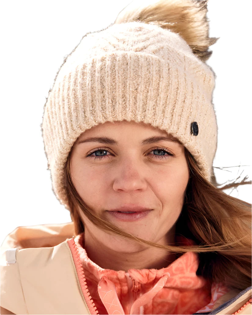 Roxy Women's Peak Chic Beanie 2025 - A cream-colored beanie with a black logo on the side.
