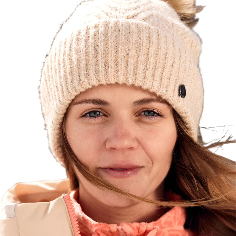 Roxy Women's Peak Chic Beanie 2025 - A cream-colored beanie with a black logo on the side.