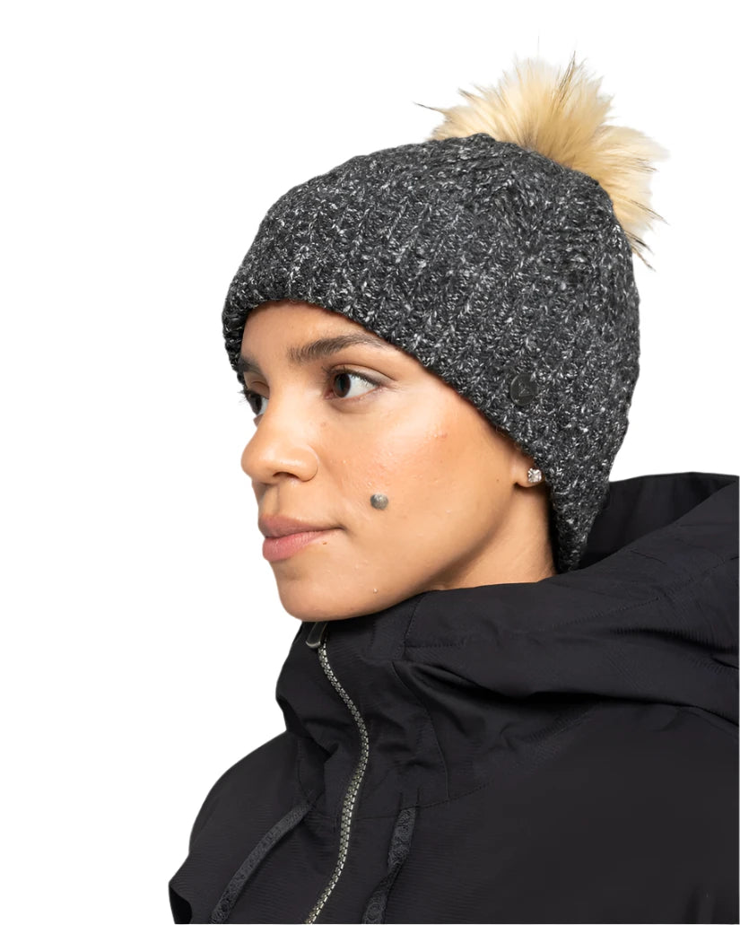 Roxy Women's Peak Chic Beanie 2025 - A heathered grey beanie with a tan faux fur pom-pom on top.