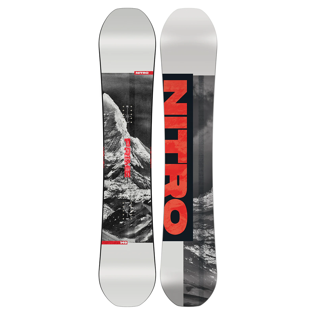 Nitro Prime Raw Snowboard 2026 - A black-and-white snowboard with a red logo and text on top of a snowy mountain peak.