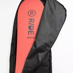 Ride Unforgiven Sleeve Snowboard Bag - A black snowboard bag with a white logo and strap on the side.