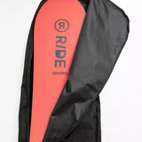 Ride Unforgiven Sleeve Snowboard Bag - A black snowboard bag with a white logo and strap on the side.