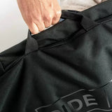 Ride Unforgiven Sleeve Snowboard Bag - Black snowboard bag with a zippered top and handle on top.