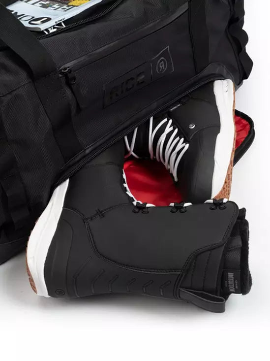 Ride Duffle Bag 2025 - Black duffel bag with zippered pocket on front and black handle.