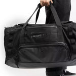 Ride Duffle Bag - Black duffel bag with zippered pockets on front.