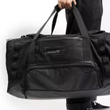 Ride Duffle Bag - Black duffel bag with zippered pockets on front.