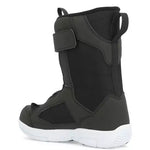Ride Junior's Norris Snowboard Boot 2025 - Black snowboard boot with a strap on top and white soles.