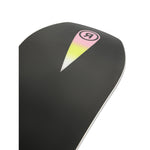 Ride Commissioner Snowboard 2025 - A black snowboard with a pink, yellow, and white gradient logo on top of it.