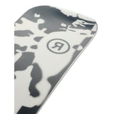 Ride Women's Compact Snowboard 2025 - A snowboard with a white base and black abstract design on top, featuring a circular logo with the letter "R" in the center.