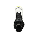 Ride Women's Hera Snowboard Boot 2025 - A black snowboard boot with a white logo on the side and a yellow strap at the top.
