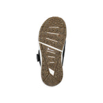 Ride Women's Hera Pro Snowboard Boot 2025 - A black and white snowboard boot with a textured brown sole.