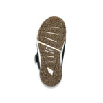 Ride Women's Hera Pro Snowboard Boot 2025 - A black and white snowboard boot with a textured brown sole.