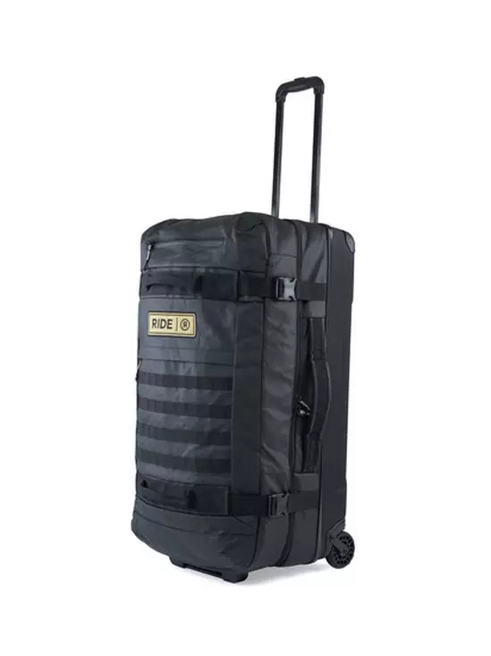 Ride Luggage Roller Snowboard Bag 2025 - Black roller bag with a handle and wheels, featuring a zippered pocket on top.