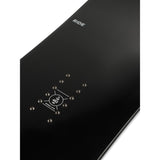 Ride Women's Magic Stick Snowboard 2025 - A black snowboard with a white logo on top and a white stripe down the middle.
