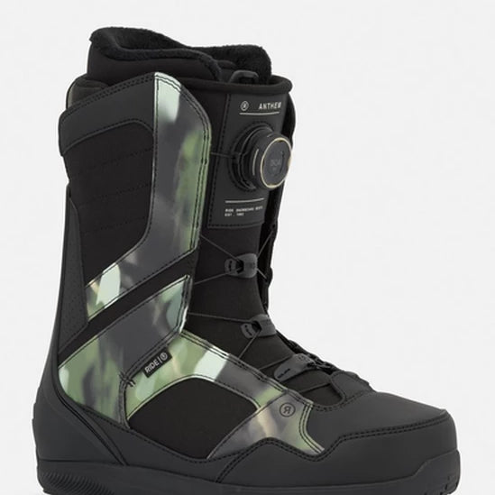 Black snowboard boots with iridescent side panels, BOA dial, and lace straps