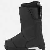 Black snowboard boots with side panel padding and vertical branding detail