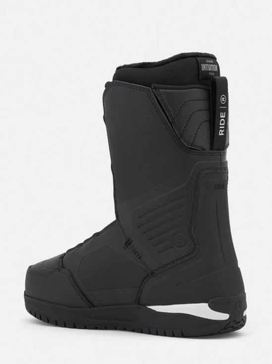 Black snowboard boots with side panel padding and vertical branding detail