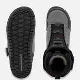 Snowboard boot sole and side view in dark color with grip tread