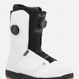 White snowboard boots with black accents, BOA dial, and lace closure