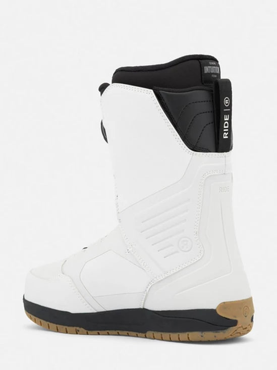 Snowboard boots with white uppers and black ankle panel, padded cuff, side view
