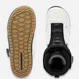 Snowboard boots with treaded outsole and black strap closure, boot opening view