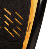 Ronix Koal Classic Fish Wakesurf Board 2024 - A black wakesurf board with a fish-shaped design and a wood grain pattern on its deck.