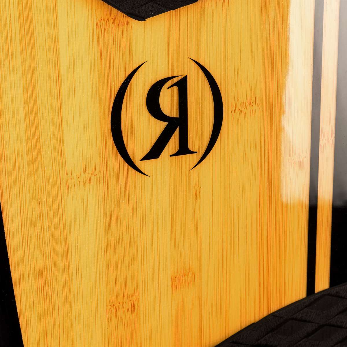 Ronix Koal Classic Fish Wakesurf Board 2024 - A light-colored wood grain board with a fish-shaped outline and fins on the bottom.