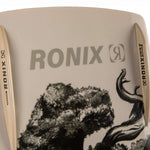 Ronix Supreme Wakeboard - A white wakeboard with a black logo on top, featuring a rider in action at the bottom.