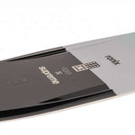 Ronix Supreme Wakeboard 2024 - A black wakeboard with a white logo and text on top, lying flat on its side.