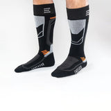 SURPLUS SOCK MEN'S 2023 - Black socks with gray stripes on top and orange accents.