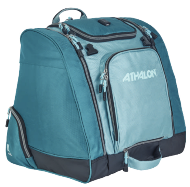 Atholon Pro's Choice Boot Bag / Backpack - A large, dark-colored backpack with a zippered front pocket and two side pockets, featuring a handle on top and adjustable straps.
