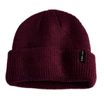 Autumn Select Beanie 2025 - A burgundy beanie with a folded cuff and a small black tag on the front.