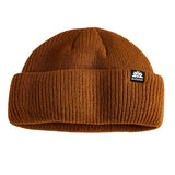 Autumn Shorty Double Roll Beanie 2025 - A warm-toned beanie with a double roll design, featuring a subtle texture and a small logo on the front.