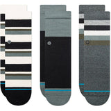 Stance Kid's Bounce Back Casual Crew Sock 3-Pack 2024 - A three-pack of casual crew socks in various colors, featuring a striped pattern on the top portion and solid-colored toes.